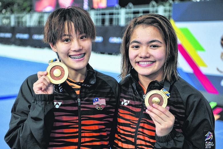 Malaysian diver Wendy Ng Yan Yee emerged yesterday as the athlete who had failed a doping test. Should she be stripped of her two titles, Singapore's silver medallists Ashlee Tan and Fong Kay Yian are then likely to claim gold.
