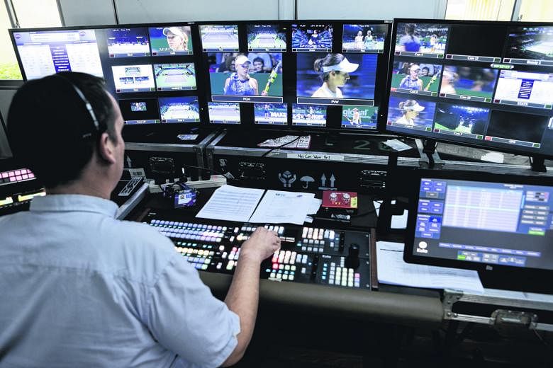 Nic Mills directing the broadcast of the match between Caroline Garcia and Caroline Wozniacki yesterday. The images are beamed to 38 international broadcasters worldwide by a team of over 50 people here.