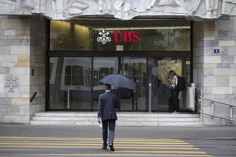Although wealth management earnings have picked up, UBS still sees risks which could keep clients from trading, including the unwinding of the European Central Bank's balance sheet and political tensions in United States-North Korea relations.