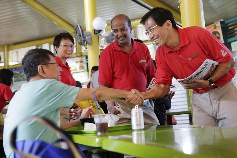 (From right) Dr Chee Soon Juan, Professor Paul Tambyah and Ms Chong Wai Fung of the Singapore Democratic Party campaigning at Adam Road Food Centre during the 2015 General Election. Prof Tambyah, the party's new chairman, said this month that the par