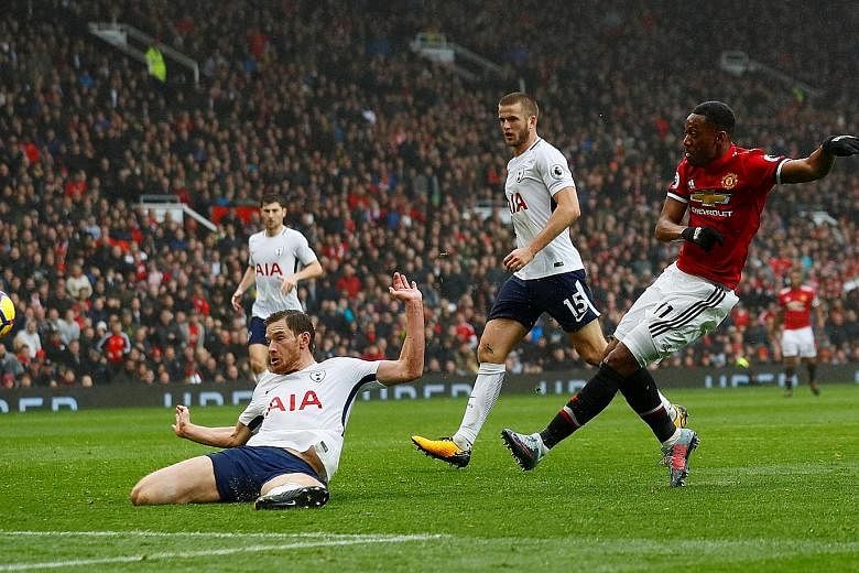 Manchester United forward Anthony Martial escaping the attention of Tottenham defender Jan Vertonghen to score his 81st-minute winner. This was United's 10th goal in the last 10 minutes of league games this season.