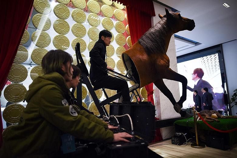 A film crew in Dachang county controlling the model of a horse last week.