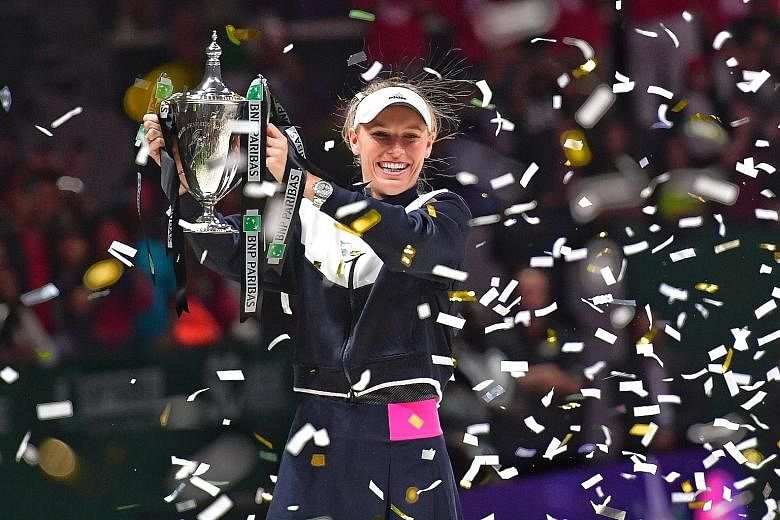 Caroline Wozniacki chose the eighth time - and the grandest occasion of them all - to post her first victory over Venus Williams. The world No. 6 beat her No. 5-ranked opponent 6-4, 6-4 yesterday to win this year's BNP Paribas WTA Finals Singapore pr