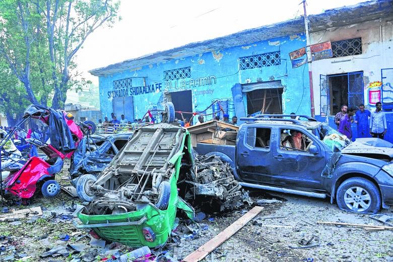 The damage at the scene of the blast last Saturday. A car packed with explosives rammed into the gates of Nasa Hablod Two hotel, while a minibus exploded at a junction nearby, destroying the front of Nasa Hablod Two hotel and the hotel next to it.