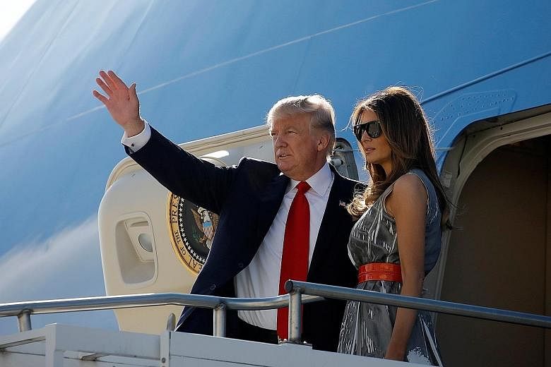 US President Donald Trump and his wife Melania boarding Air Force One in Hamburg, Germany, in July. Mr Trump's first stop in Asia next week is Japan.