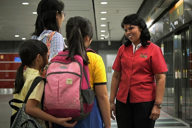 Buona Vista MRT station service ambassador Vasaki Perumal said her job has its challenges, but she would always retain her smile. She often leads a man with visual disability and his guide dog to the bus stop, and then helps him find a seat on the bu