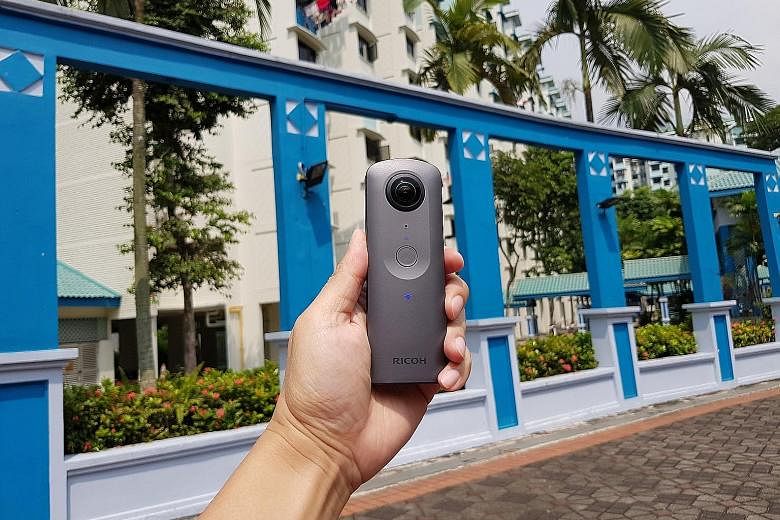 The Theta V has a slim candy-bar body, with a 180-degree lens on both its front and back. With it, you can capture a 360-degree shot.