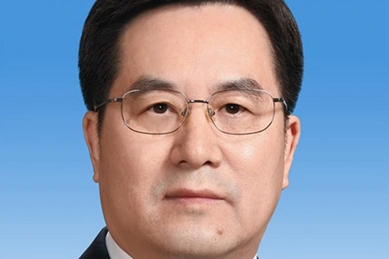 Mr Huang Kunming (top), 60, is the new head of propaganda of the Chinese Communist Party, while Mr Ding Xuexiang, 55, is director of the General Office of the party's Central Committee.