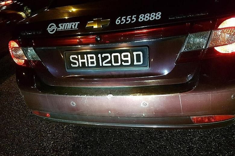 Mr Chia's wife, Ms Roseline Fong, has posted photos in a blog showing the seeming lack of damage to the taxi (left), whose driver had accused the Audi (middle) of rear-ending it. Other photos (below) showed the apparent distance between the two vehic