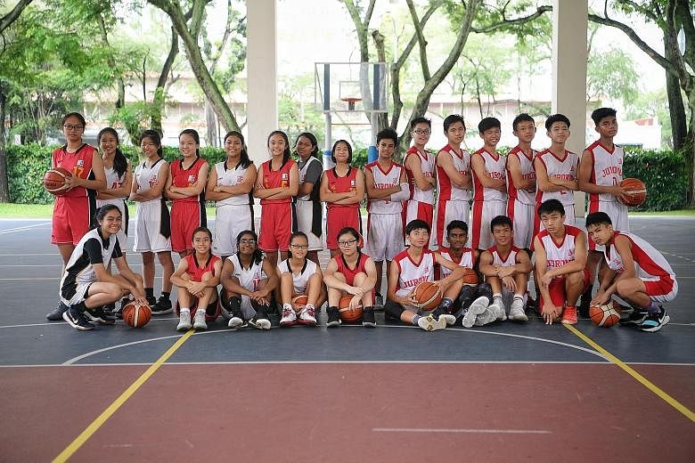 At Dunman Secondary School, Chinese students account for only half of the basketball players.