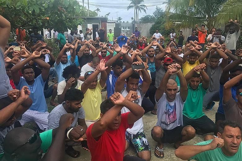 Refugees in Papua New Guinea's Manus Island detention camp protesting on Tuesday when they learnt of the camp's imminent closure that day. The picture was taken by Senator Nick McKim, an Australian Greens MP representing Tasmania. Hundreds of "scared