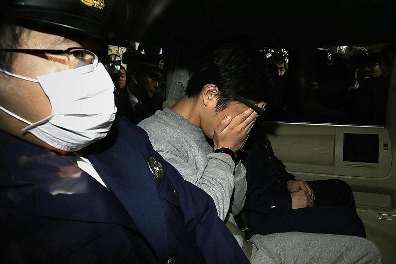 Suspect Takahiro Shiraishi (above and left, in a police car) was arrested after police found nine dismembered corpses rotting in his house.