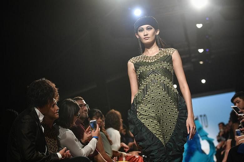 Designs showcased at Singapore Fashion Week include those from Singapore's Adrianna Yariqa (top), Japan's Zin Kato (above) and Malaysia's Bill Keith (below).