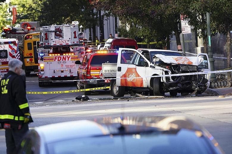 The truck allegedly used by Sayfullo Saipov to hit pedestrians in New York City on Tuesday. He was shot in the abdomen by police but survived and was taken into custody. He left notes in Arabic saying that the Islamic State in Iraq and Syria would en
