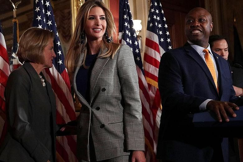 Ms Ivanka Trump, flanked by senators Shelley Moore Capito and Tim Scott, at a news conference last month. She had joined Republican legislators to discuss the child tax credit.