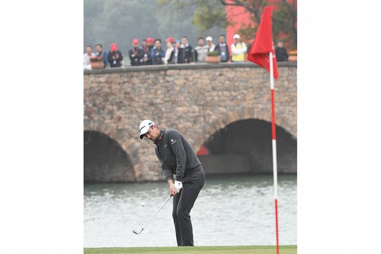 Justin Rose in action at the WGC-HSBC Champions in Shanghai, where he stormed back from eight shots behind third-round leader Dustin Johnson to win last Sunday's event by two strokes. The Englishman is excited that Tiger Woods will be back in action 
