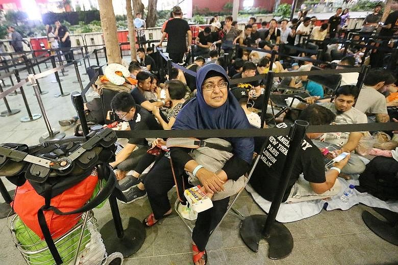 With the new iPhone X smartphone going on sale today at the Apple Store in Orchard, those hoping to land one did not waste time getting in line. 	First in the queue was Madam Ila Ahmad. The 52-year-old housewife, armed with Milo, mineral water, bread