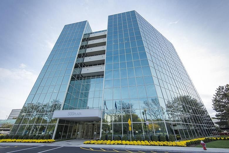 Manulife US Real Estate Investment Trust's maiden acquisition, 500 Plaza Drive in New Jersey. The Reit's gross revenue of US$23 million (S$31.3 million) beat its projection by 16.8 per cent for the quarter due to income from 500 Plaza Drive, among ot