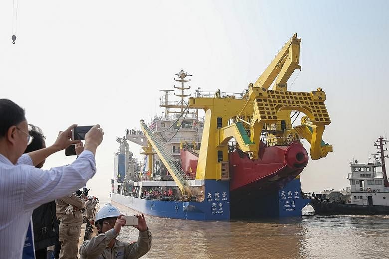 The ship, named Tian Kun Hao, was launched last Friday at a port in Jiangsu province and has been described as Asia's largest dredging vessel. The ship is capable of building artificial islands and will be able to dig 6,000 cubic m an hour, said Chin