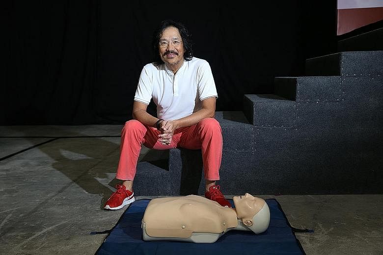 Mr Yeo Guan Kai, who had a cardiac arrest two years ago, participated in a three-hour mass CPR and AED course yesterday.