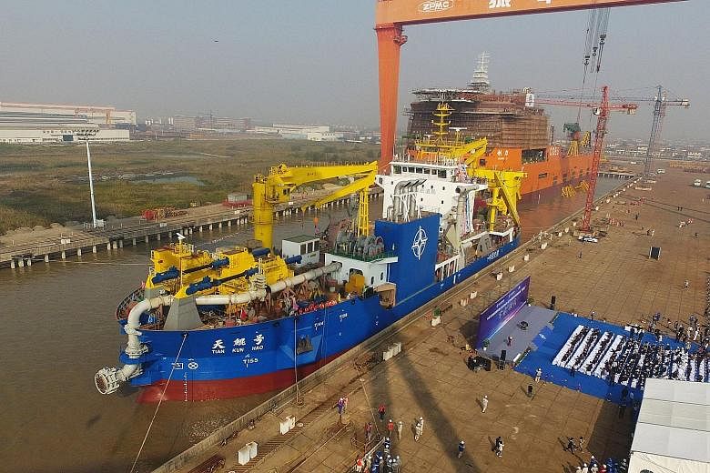 The dredger being launched at a port in Qidong in China's eastern Jiangsu province last Friday.