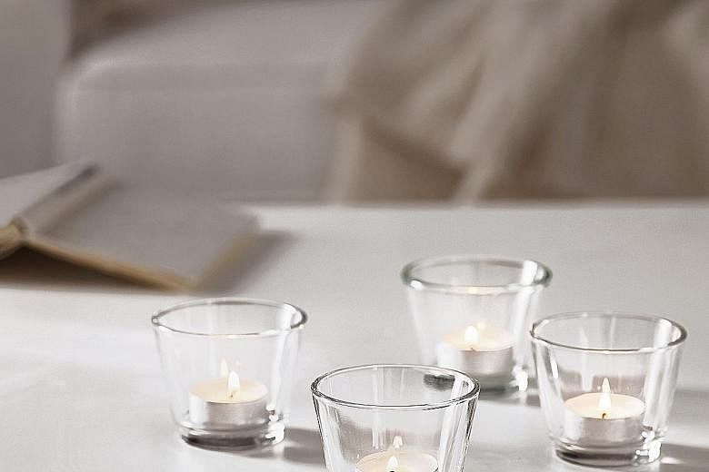 About 7,000 products from Ikea, including furniture (above) and home accessories such as tealights (left), are available online.