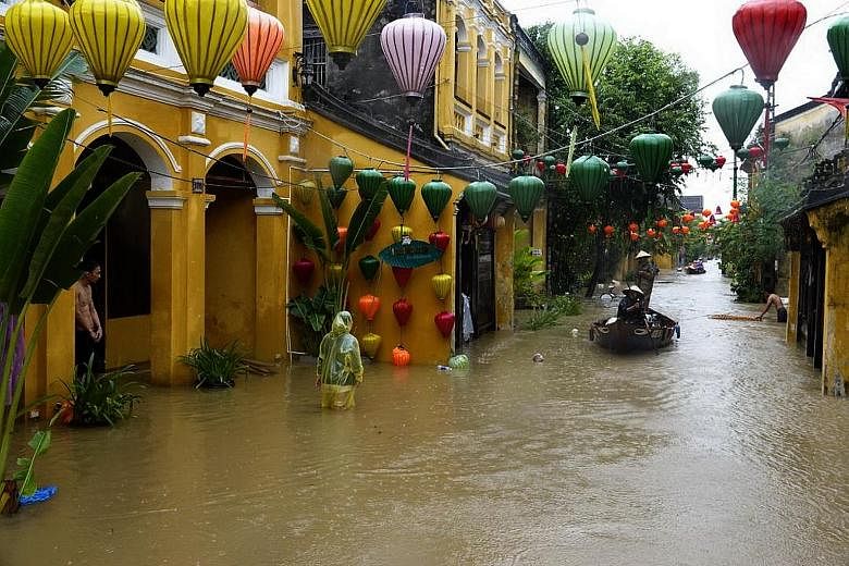 Floodwater was up to 1.5m deep in some parts of the popular tourist town of Hoi An yesterday after Typhoon Damrey barrelled into Vietnam. More than 30,000 people, including tourists, were evacuated ahead of the storm, which saw heavy rain and 130kmh 