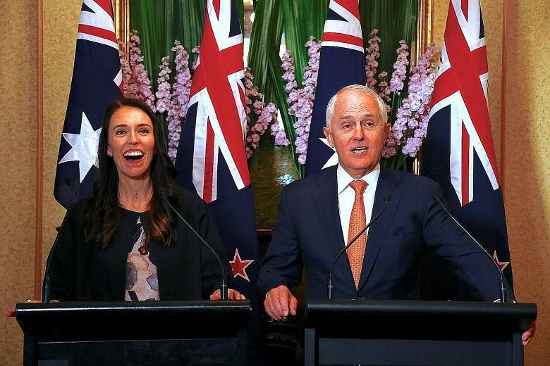 Australian Prime Minister Malcolm Turnbull and his New Zealand counterpart Jacinda Ardern at a press conference in Sydney yesterday.