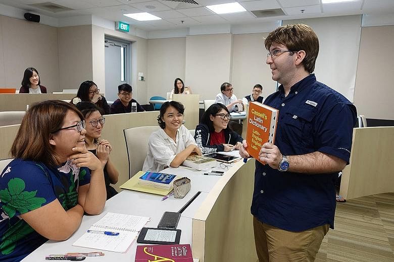 Dr Perono Cacciafoco Francesco teaching a Latin class at NTU. It is the first time any university here is offering Latin classes.