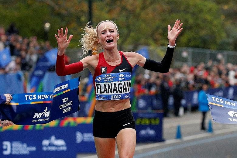 Shalane Flanagan, a 10,000m silver medallist at the 2008 Olympics, crossing the finish line to win the women's race at the New York City Marathon. It was the biggest marathon victory of the 36-year-old American's career.