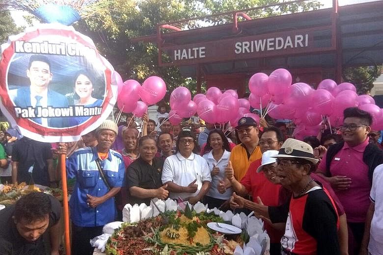 Residents in Solo (left) hold prayer gatherings and parties where they eat tumpeng. Ms Kahiyang Ayu and Mr Bobby Nasution (above) first met in 2015 when they were at the Bogor Agricultural University in Bogor.