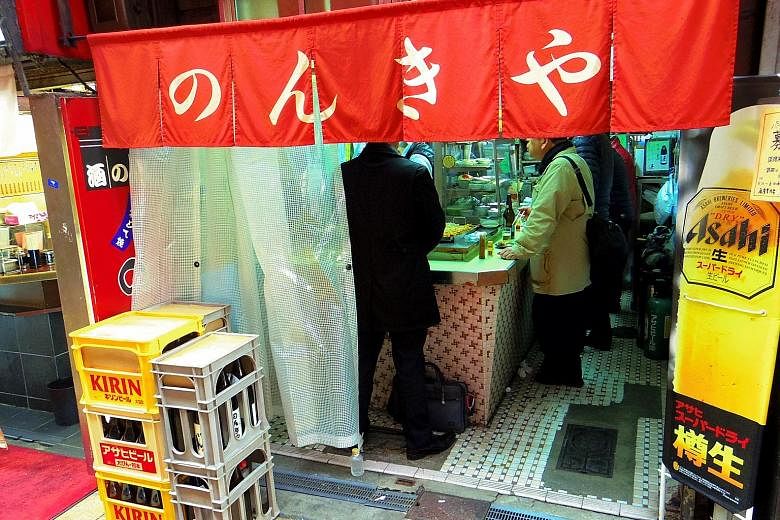 (Left) A tachigui stall in Tokyo that serves hot oden - a Japanese winter dish similar to yong tau foo. "Tachigui provides a great option for people who do not have companions to eat with but want to eat out, or have no time to cook," says tachigui r