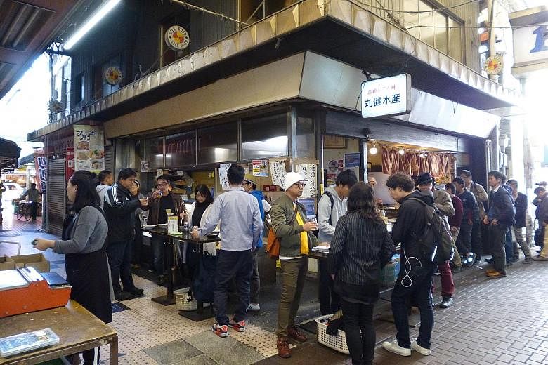(Left) A tachigui stall in Tokyo that serves hot oden - a Japanese winter dish similar to yong tau foo. "Tachigui provides a great option for people who do not have companions to eat with but want to eat out, or have no time to cook," says tachigui r