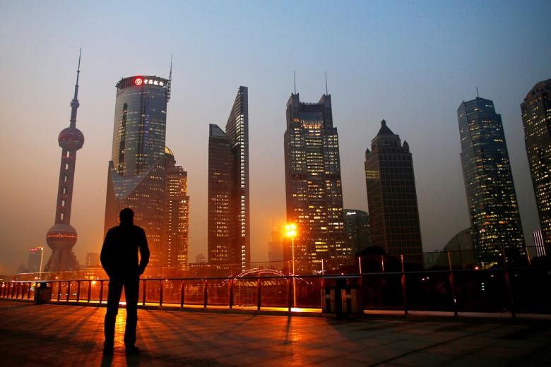 The Pudong financial district of Shanghai. While it is true that the Chinese economy has a higher degree of state intervention than many developed economies, its fast growth can hardly be used as a case against free market capitalism, says the writer