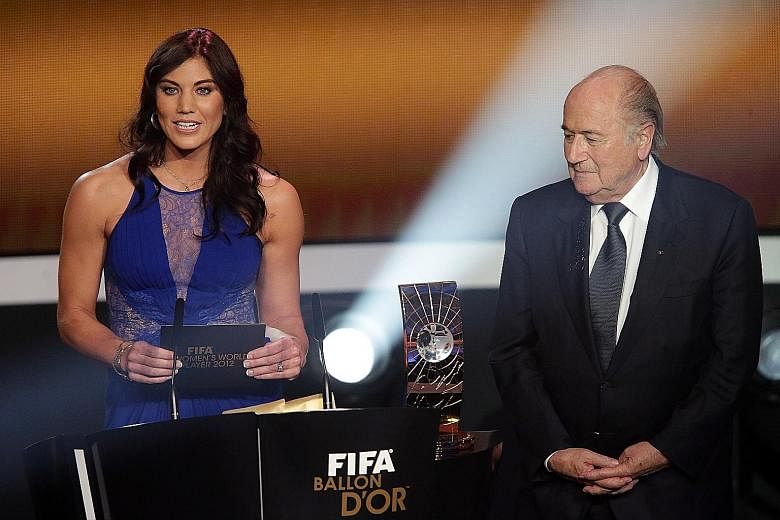 US national team goalkeeper Hope Solo and Mr Sepp Blatter at the 2013 Ballon d'Or ceremony in Zurich.