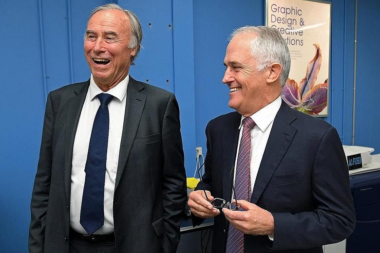Mr John Alexander (left), with Mr Malcolm Turnbull in April, could not determine if he had inherited British citizenship from his father.