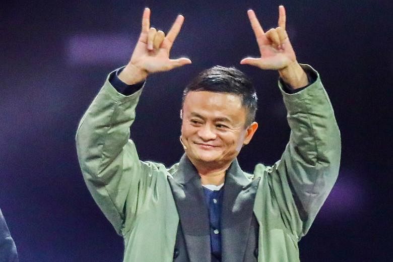 Alibaba founder Jack Ma gesturing to fans during the Tmall 11.11 Global Shopping Festival gala in Shanghai yesterday.