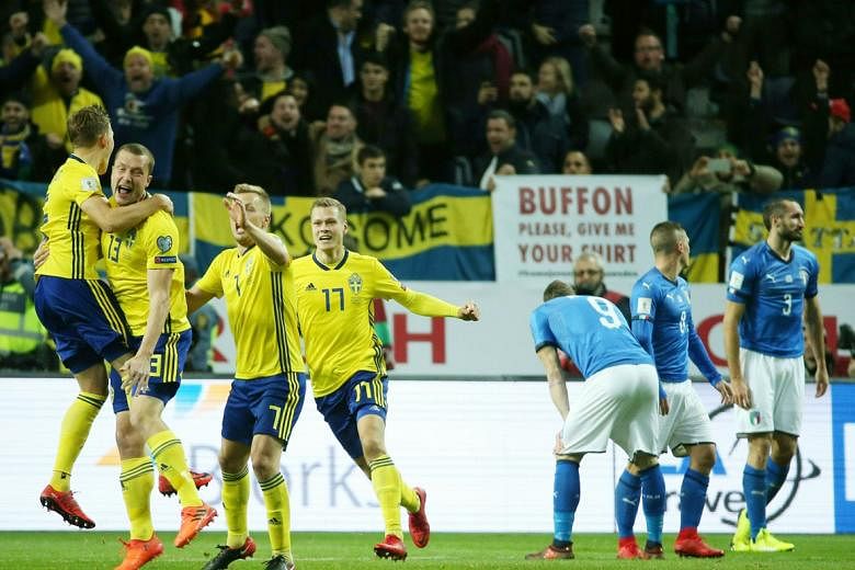 Sweden midfielder Jakob Johansson (No. 13) celebrating his goal which took a wicked deflection off Italy's Daniele De Rossi. The four-time champions have it all to do in the second leg in Milan tomorrow.