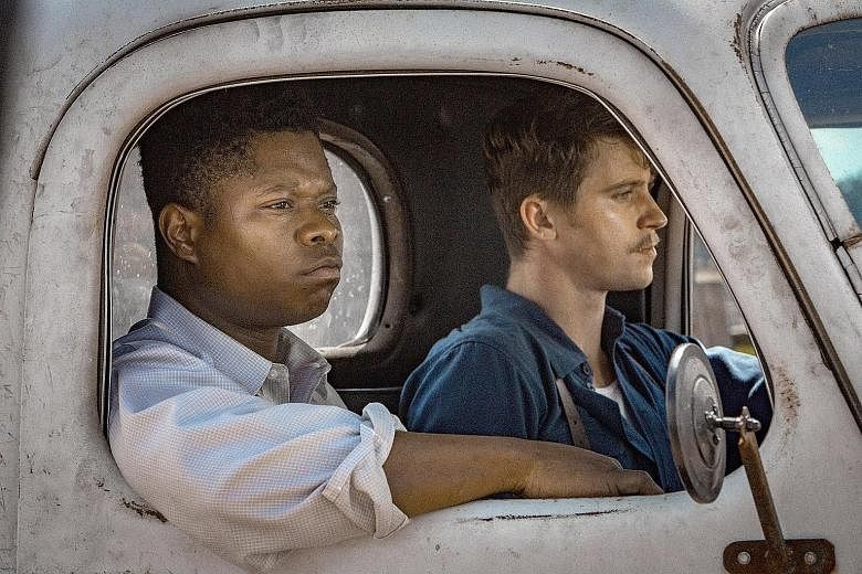 Mudbound, which stars Jason Mitchell (left) and Garrett Hedlund, grapples with violence, racism and poverty.