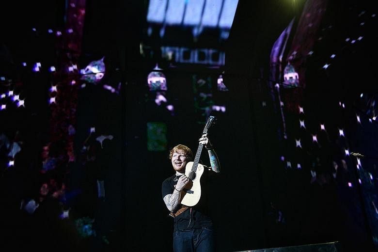 The concert at the Singapore Indoor Stadium last Saturday was Ed Sheeran's first gig since a bicycle accident last month that left him with a broken wrist, elbow and rib.