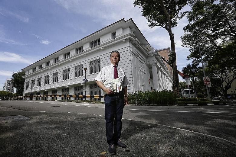 Researcher Lim Shaobin, who learnt through Japanese war documents that Singapore served as a base for the operation, seen here in front of the College of Medicine Building, which housed the Japanese research unit.