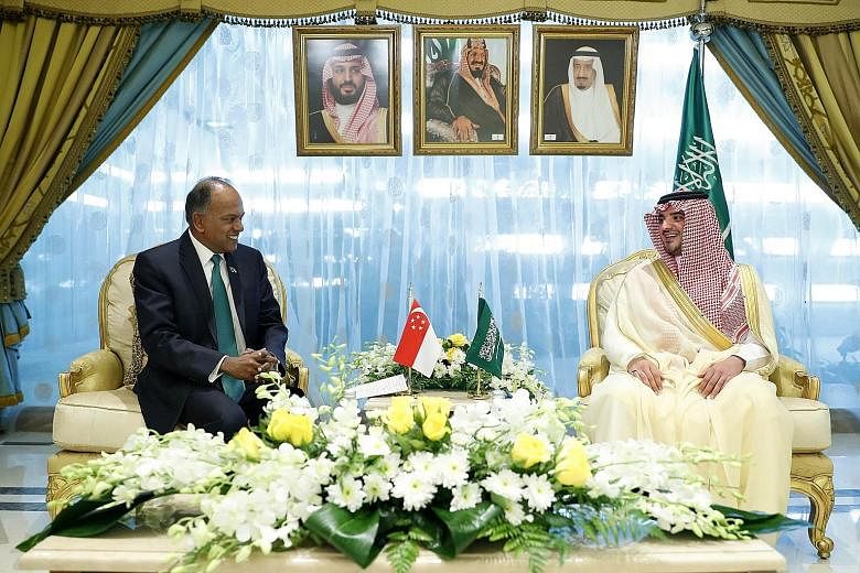 Home Affairs and Law Minister K. Shanmugam with Saudi Arabia's Interior Minister Abdulaziz bin Saud bin Nayef in Riyadh yesterday, where they discussed issues related to bilateral security cooperation as well as the global terrorism threat.