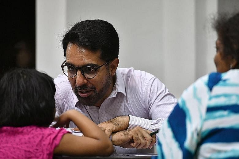 Workers' Party MP Pritam Singh at his Meet-the-People Session in Jalan Damai last night. He has taken on a higher profile than other MPs of late. He was made assistant secretary-general, and chairs the Aljunied-Hougang Town Council and the WP 60th an