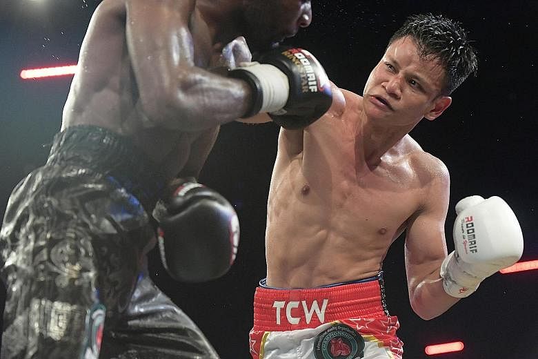 Muhamad Ridhwan landing a punch en route to winning his IBO International Super Featherweight title last month. When he eventually hangs up his gloves, the boxer may well be putting an end to a part of his self that will be difficult to replicate out