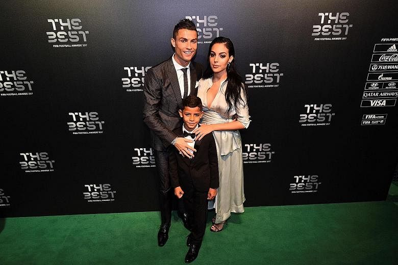 Cristiano Ronaldo with partner Georgina Rodriguez and his first child Cristiano Jr. Rodriguez gave birth to a baby girl, Alana Martina, on Sunday. He is also the father of surrogate twins Eva and Mateo.