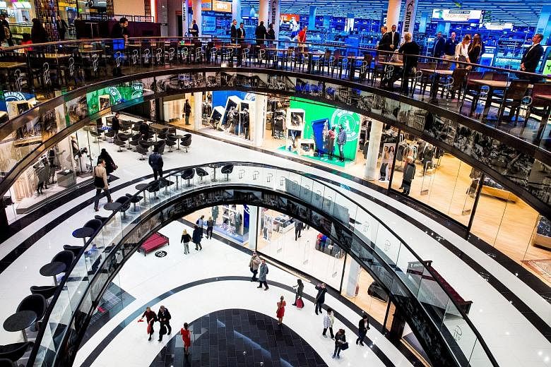 The Mall of Berlin shopping centre. Germany is enjoying a consumer-led upswing, helped by record-high employment, moderate inflation and ultra-low borrowing costs. The upturn is boosting tax revenues and the Budget surplus.