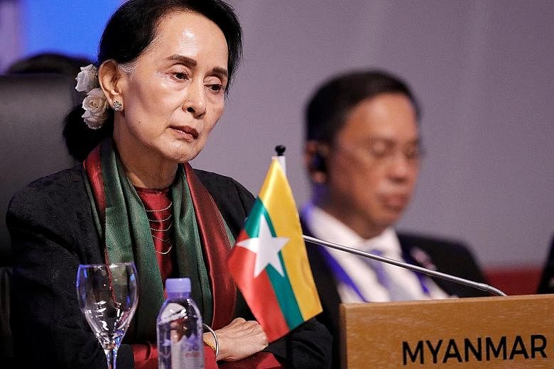 On the Rohingya issue, supporters of Myanmar leader Aung San Suu Kyi say she must navigate a path between outrage abroad and popular sentiment in a Buddhist-majority country.