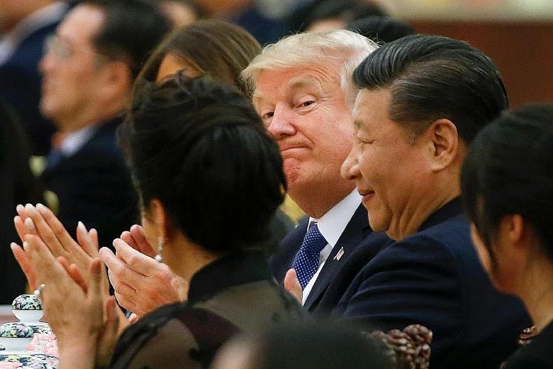 US President Donald Trump and Chinese President Xi Jinping at a state dinner at the Great Hall of the People in Beijing last week. Mr Trump's visit had strengthened US alliances in North-east Asia, says one analyst.