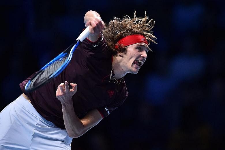 Germany's Alexander Zverev returning against Swiss Roger Federer during their ATP Finals round-robin match on Tuesday. The world No. 3, despite his defeat, can still reach the semi-finals on Saturday if he can get past American Jack Sock today.