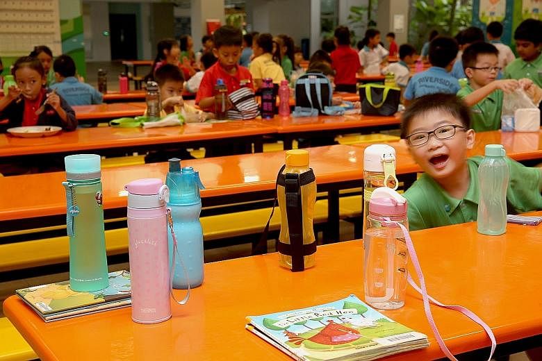 Pupils at Riverside Primary School in Woodlands Crescent are encouraged to bring their water bottles every day and to refill them at the water coolers, says principal Sharon Siew. The school, which started in 2013, has never had a drinks stall.